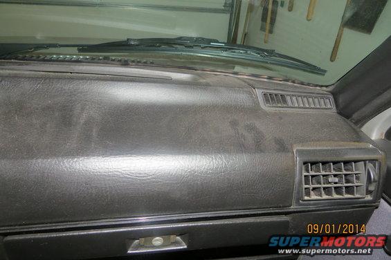 Car dashboard with air vents and windshield wipers visible. Date stamp reads 09/01/2014