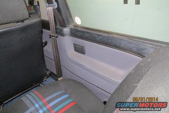 Interior door panel and seat fabric with red, blue, and green stripes