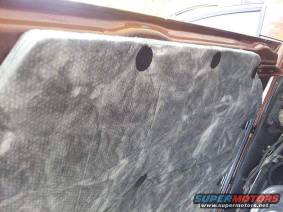 hood insulation pad with three circular cutouts