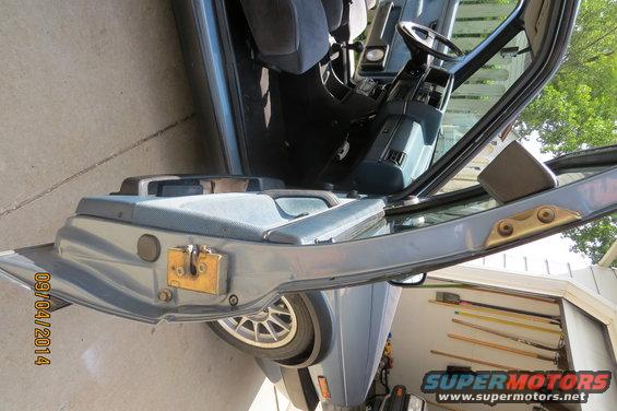 Blue 1990 Volkswagen Jetta interior, driver's side door open
