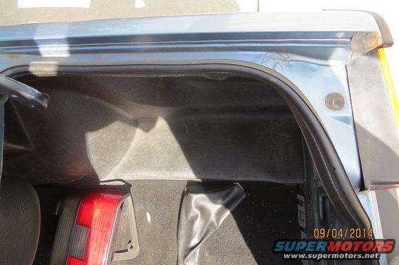 Trunk interior with taillight and boot cover