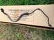 1979 Ford Bronco - A single brake line is shown resting on a cardboard box with "OPEN BOXES IMMEDIATELY!" printed on it.