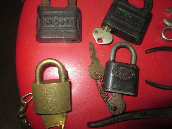 Four padlocks with keys, two marked SARGENT, one marked U.S