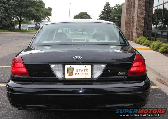 Black 2009 Ford Crown Victoria rear with State Patrol license plate