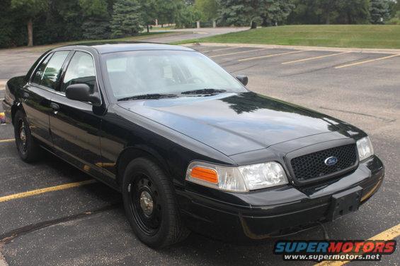 Black 2009 Ford Crown Victoria sedan, front quarter view