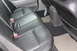 2009 Ford Crown Victoria - Rear interior view of a 2009 Ford Crown Victoria showing the leather seats and console.