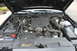 2009 Ford Crown Victoria - The engine bay of a 2009 Ford Crown Victoria is shown with the hood open.