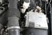 2009 Ford Crown Victoria - Close-up view of an engine compartment, focusing on the air intake system and ECU.