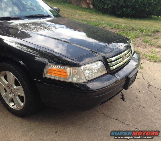 grille_09.jpg 7W7Z-8200-A grille with 2011 sport LX wheels.