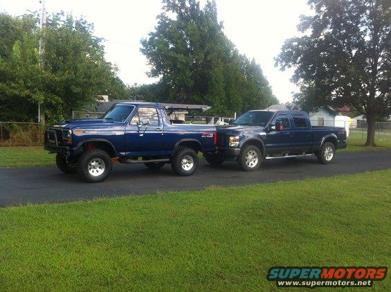 1980 Ford Bronco and a newer Ford F-Series truck parked on a driveway