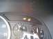 2004 Cadillac CTS - The dashboard displays illuminated warning lights for trailer towing and traction control.