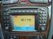 2004 Cadillac CTS - The dashboard of a car features a radio display showing the station 93.1 FM, along with climate controls below.