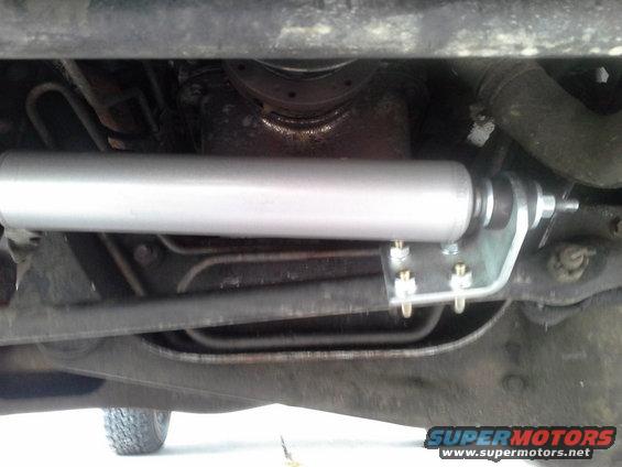 Extended the shock absorber 4.5 inches and attached the tie rod bracket and u bolts