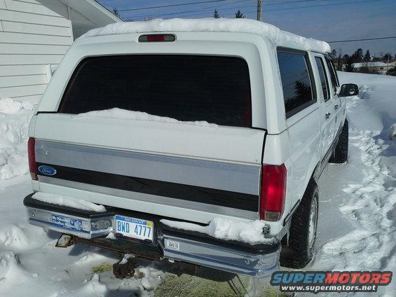 1996 Ford Bronco rear view in snow, license plate BWD 4777