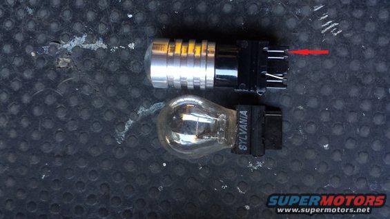 LED bulb next to Sylvania incandescent bulb