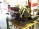 1974 Dodge Challenger - Engine assembly with chrome headers and black valve covers is prepared for installation.