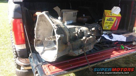 Transmission and torque converter in the bed of a pickup truck