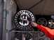 1990 Ford Bronco - Custom rims with a dollar sign design are displayed for sale.