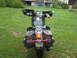 1998 Honda Shadow VT750C - This motorcycle is equipped with large, studded saddlebags and a windshield.