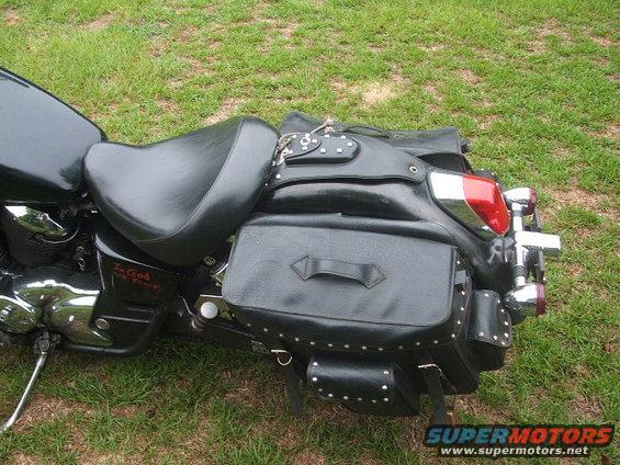 Side view of a 1998 Honda Shadow VT750C with leather saddlebags and a custom seat