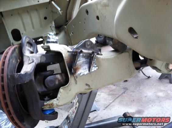 Front suspension assembly with brake rotor and ball joint
