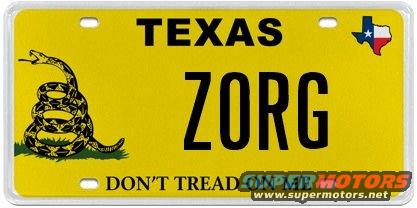 Yellow Texas license plate with black text 'ZORG' and Gadsden flag snake symbol