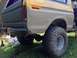 1979 Ford Bronco - This lifted Ford Bronco shows off its large tires and two-tone paint job, with the lower body in primer.