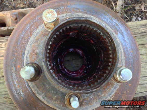 Greased wheel hub with splines and lug bolts