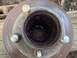 1979 Ford Bronco - Close-up view of a greased wheel hub, showing the internal splines and lug bolt mounts.