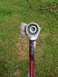 1979 Ford Bronco - A close-up shows a ratchet wrench holding a bearing, with grass in the background.