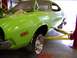 1974 Dodge Challenger - 1974 Dodge Challenger undergoing front suspension work on a car lift.