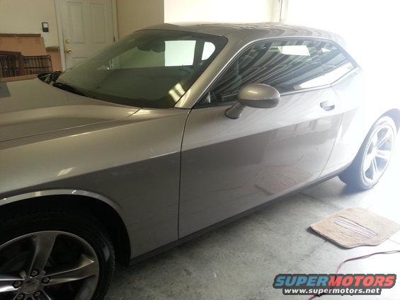 Silver 2015 Dodge Challenger coupe, 3/4 front view