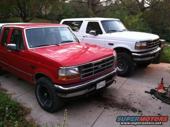 Rusty pickup next to the bronco
