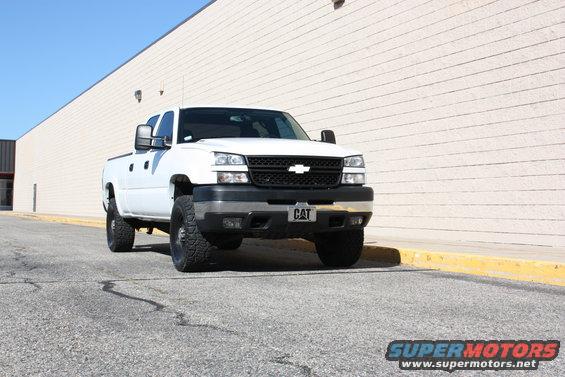 White 2006 Chevrolet Silverado 2500 front view with CAT license plate