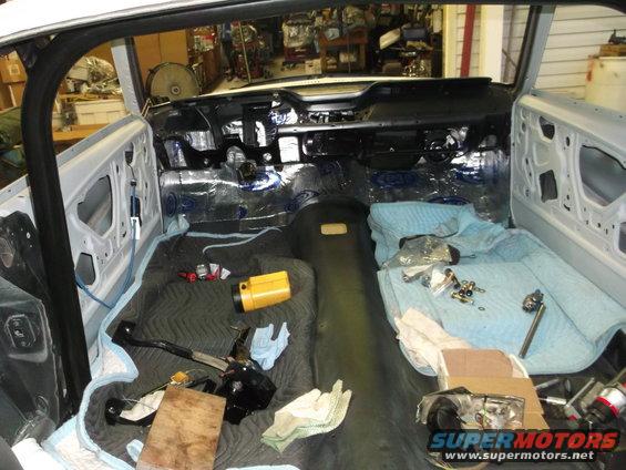 1967 Ford Mustang interior with sound deadening and parts