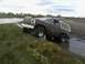 1980 Ford Bronco - This 1980 Ford Bronco navigates a muddy off-road course with water hazards.