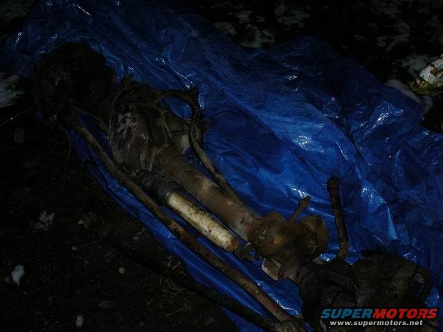 Dana 60 axle parts on blue tarp