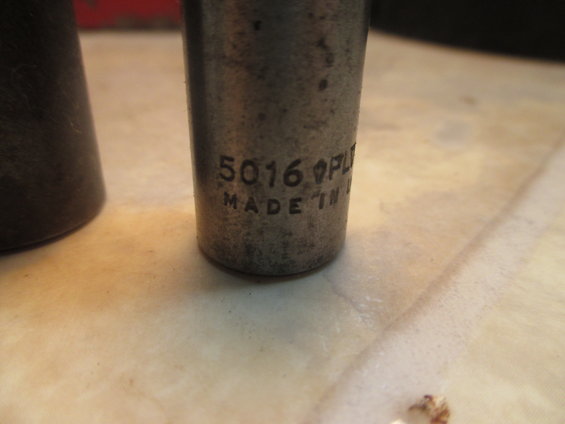 Close-up of a metal socket with markings '5016 OPL' and 'MADE IN U.S.A.'