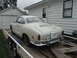 1969 Volkswagen Karmann Ghia - Rear view of a 1969 Volkswagen Karmann Ghia being transported on a trailer.