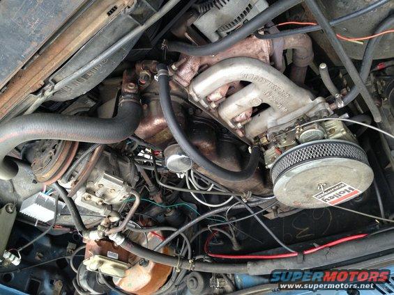 Engine bay with Holley carburetor and air filter