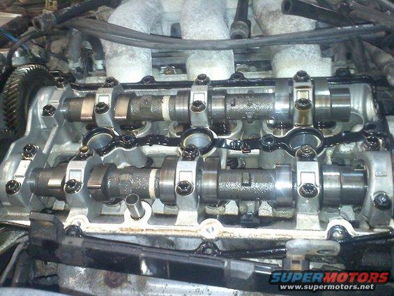 Close-up of engine camshafts and valve train components