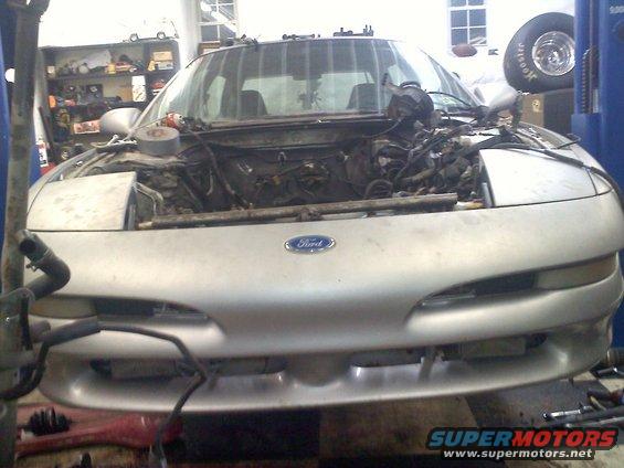 Silver 1993 Ford Probe with engine bay open, front view