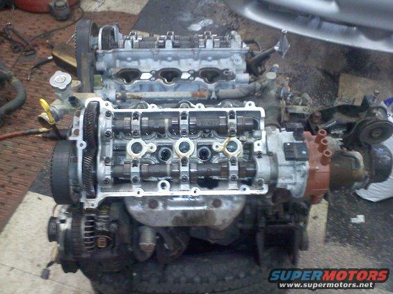 Engine with exposed camshafts and timing gears
