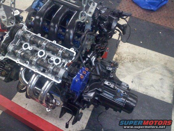Engine with exposed camshafts and chrome exhaust manifold