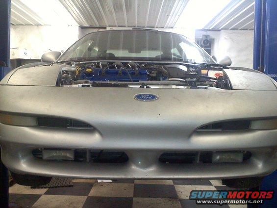 Silver 1993 Ford Probe front view, hood open