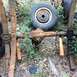 1979 Ford Bronco - Rusty rear axle assembly with leaf springs and shock absorbers, likely from an older truck or SUV.