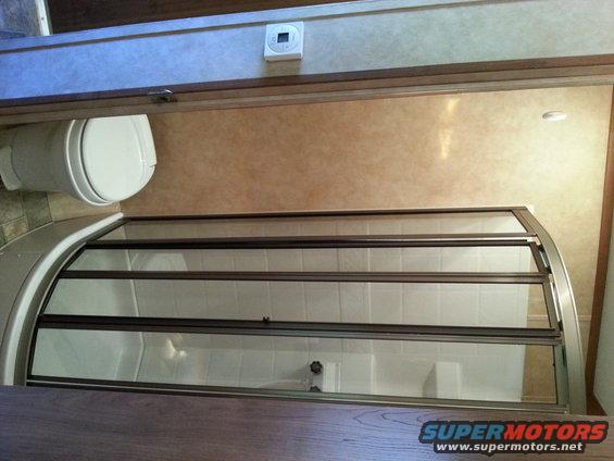 RV bathroom interior with toilet and shower stall