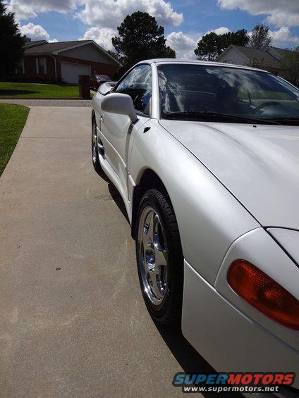 White 1995 Mitsubishi 3000GT parked on a driveway