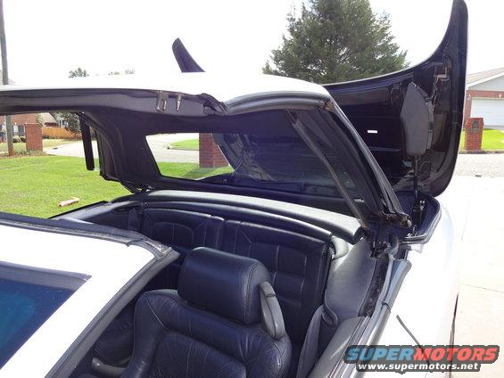 1995 Mitsubishi 3000GT convertible hardtop mechanism with rear seats visible