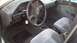 1993 Mercury Tracer - Interior view of a 1993 Mercury Tracer, showing the dashboard, steering wheel, and front seats.
